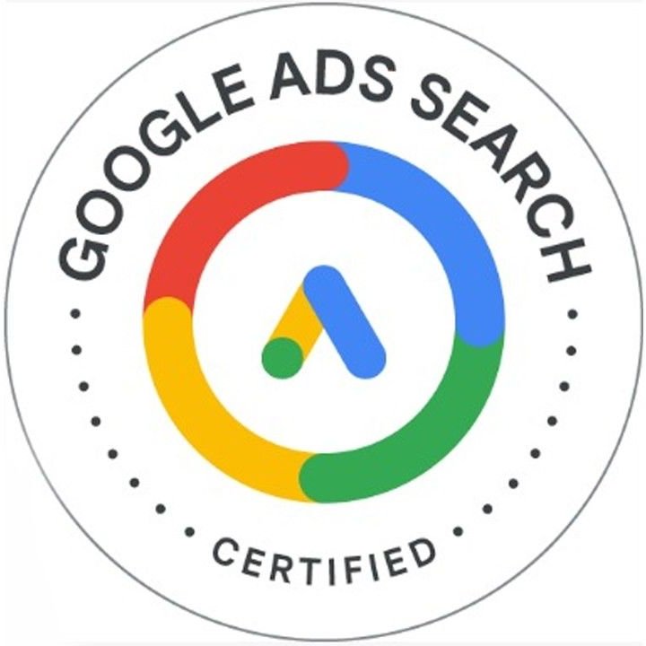 Pyöreä Google Ads Search Certified -merkki, jossa on punainen, sininen, vihreä ja keltainen ympyrä sekä Google Ads -logo keskellä.